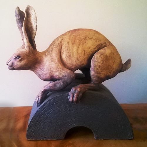 sculpture of crouching hare