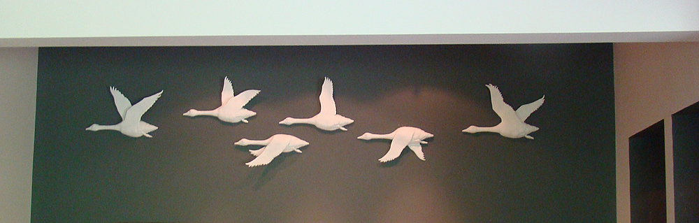 Ceramic geese on wall